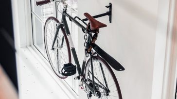 Photo depicting how to store your fixie on a wall.