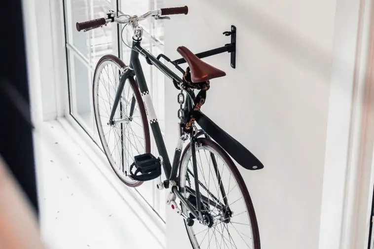 Image of a fixed gear bike hanging on wall.
