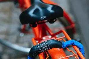Image of a bike secured with a combination lock. Source: Unsplash