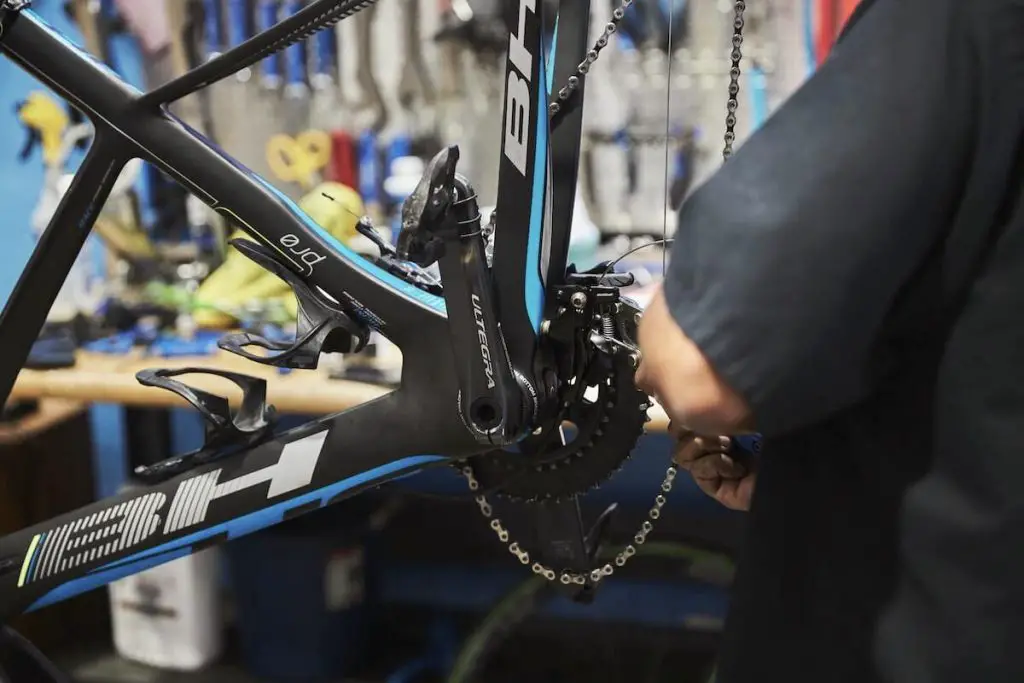 Costly and complex road bike repair depicting why fixies beat road bikes for city commuting.