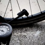 Bike tire getting inflated with gauged air pump. Source: TheDigitalWay, Pixabay