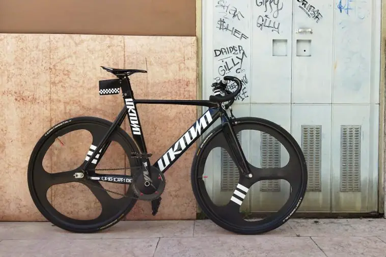 Image of a black Unknown track bike leaning on wall. Source: Joshua Warman, Unsplash