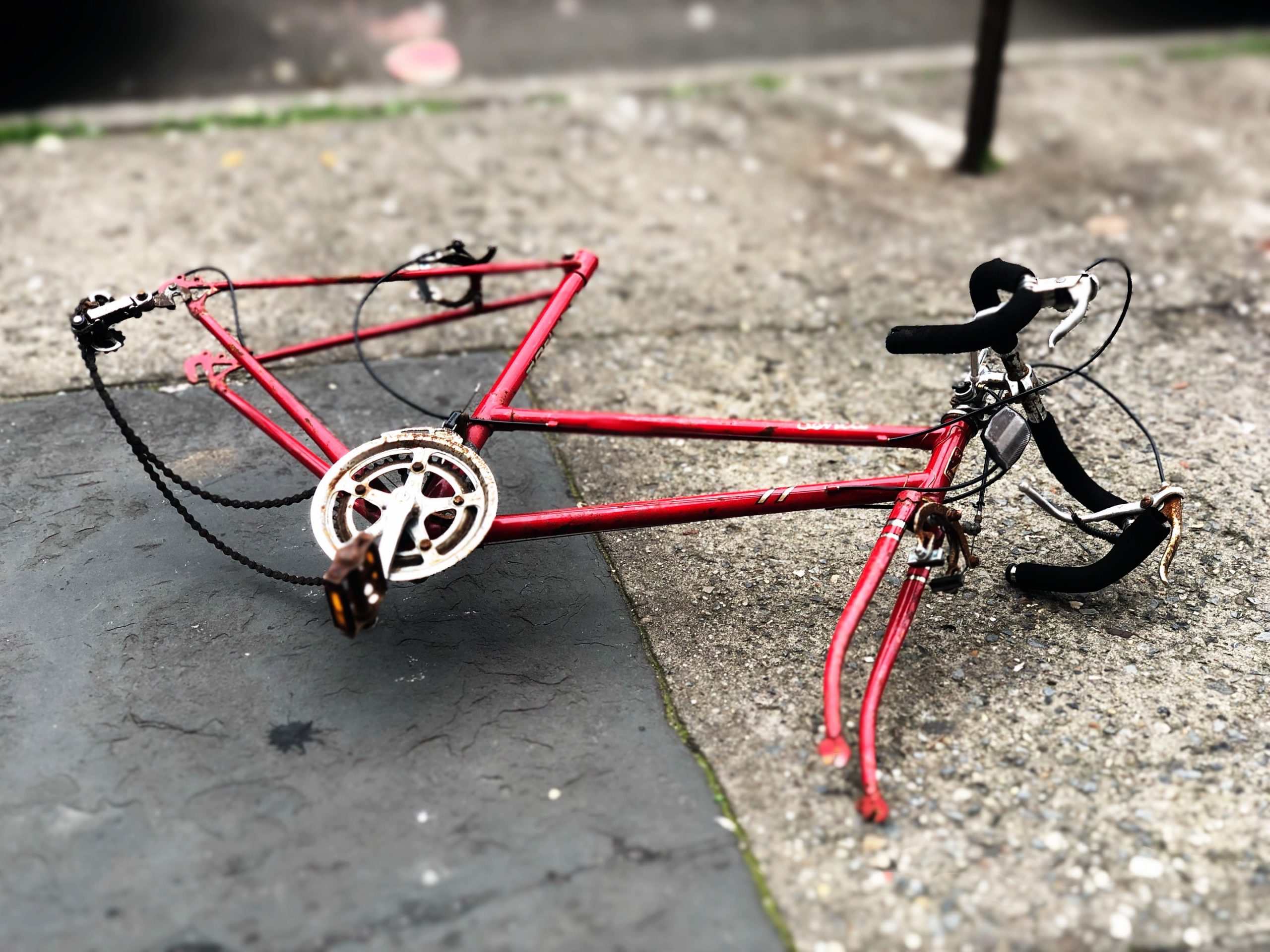 How to paint a bike frame (6 easy steps) - image of a disassembled and old red bike frame. Source lance grandahl unsplash scaled - brooklyn fixed gear Image of a disassembled and old red bike frame. Source: lance grandahl, unsplash