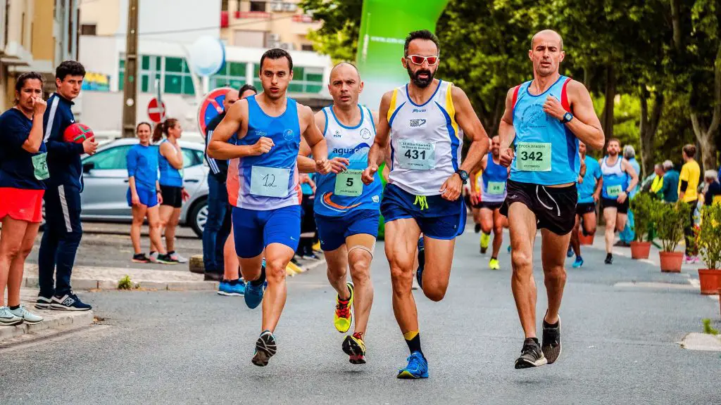 Image of men in a running race. Source: run ffwpu, pexels