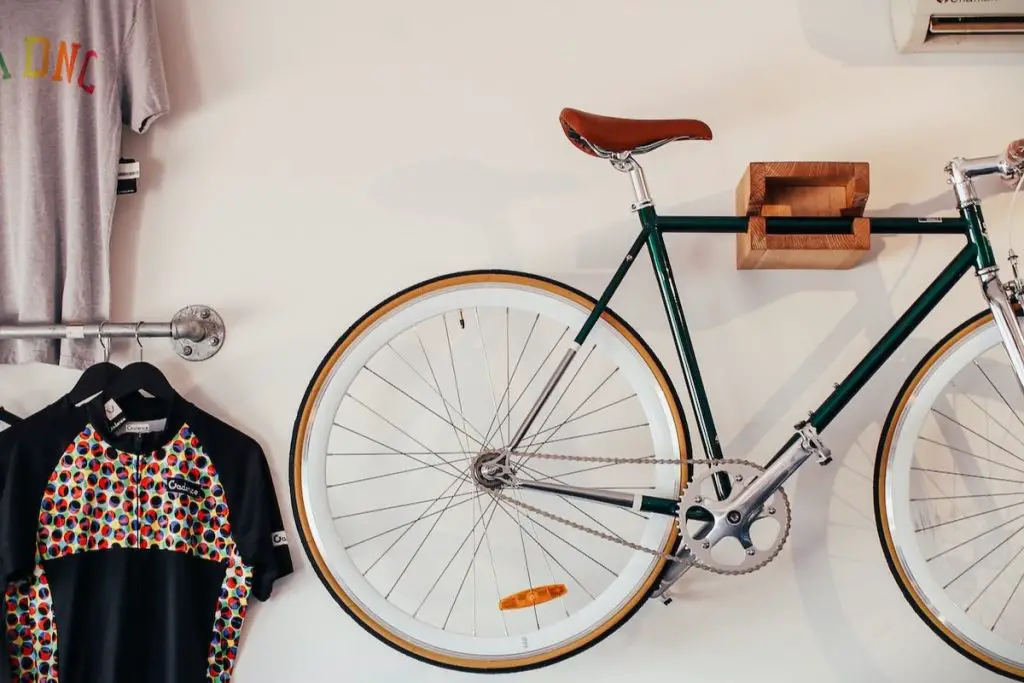 Image of a bicycle mounted on the wall. Source: unsplash