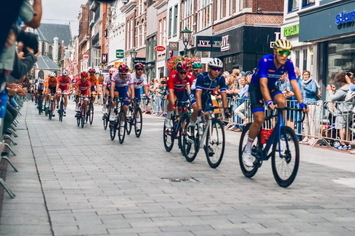 A group of cyclists in a race. Source: unsplash