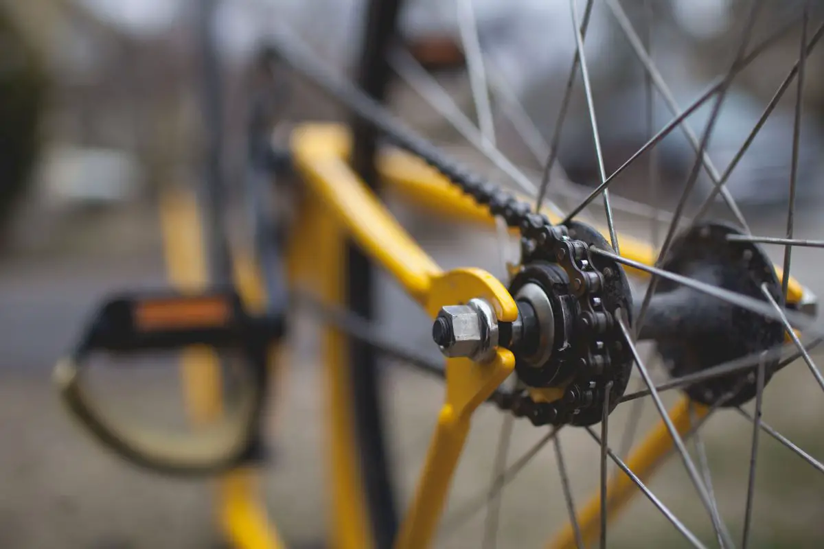 Closeup of a bike chain and axle. Source: unsplash
